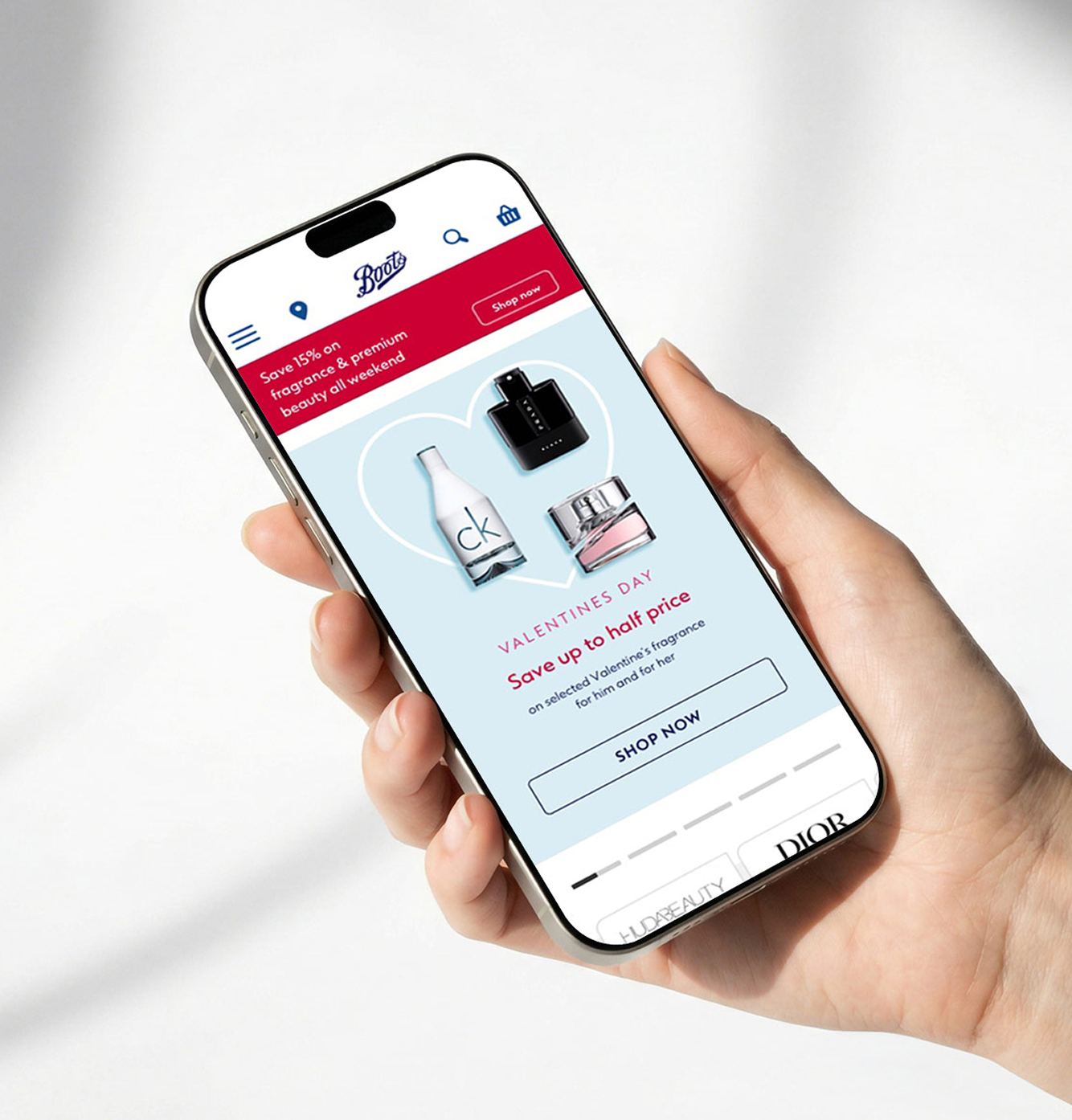 Boots.com Valentine's Day promotion shown on a phone held in hand